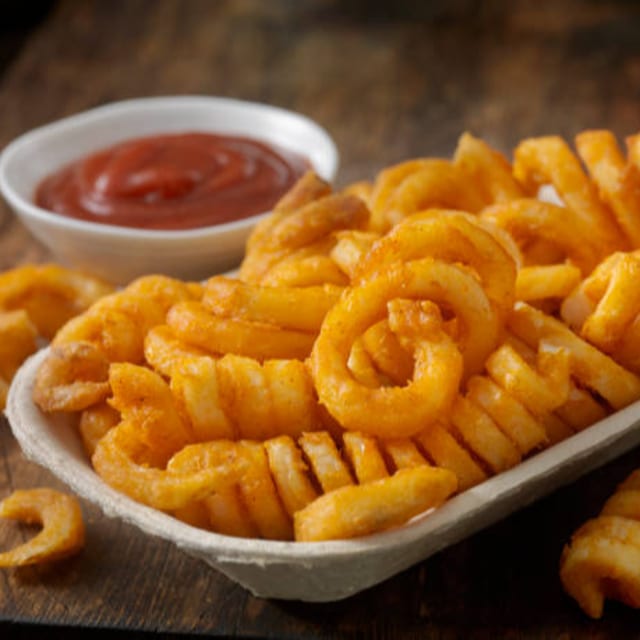 Fresh Curly Fries with House Sauce.
